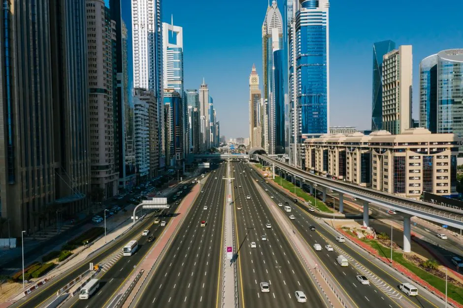 Sheikh Zayed Road's towers and the Dubai Metro line seen from above